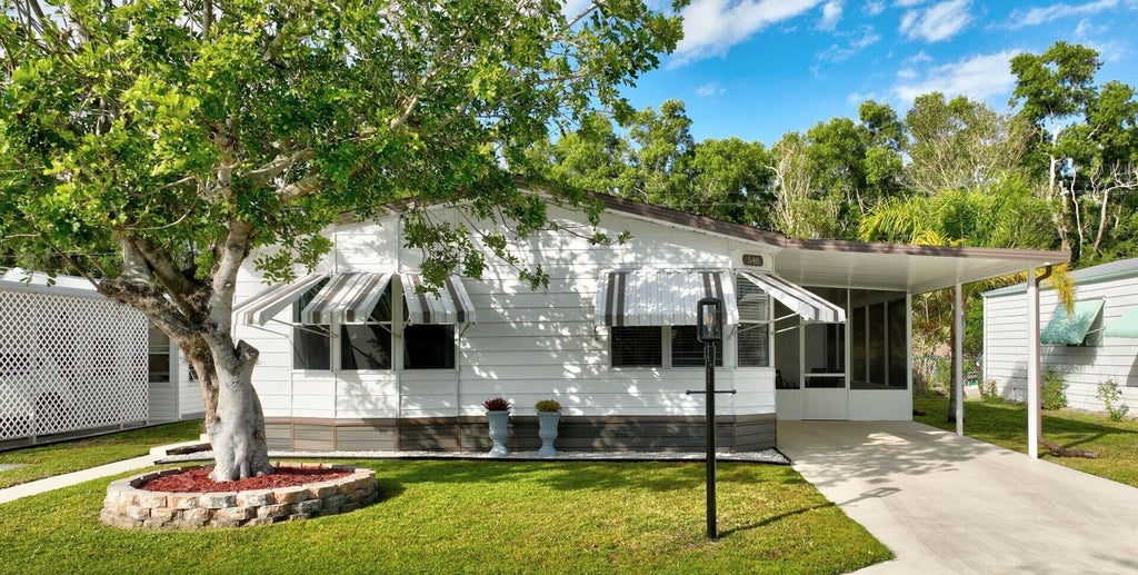 Photo of 540 Natalie Drive, Port Saint Lucie, FL 34952 (MLS # R11050478)