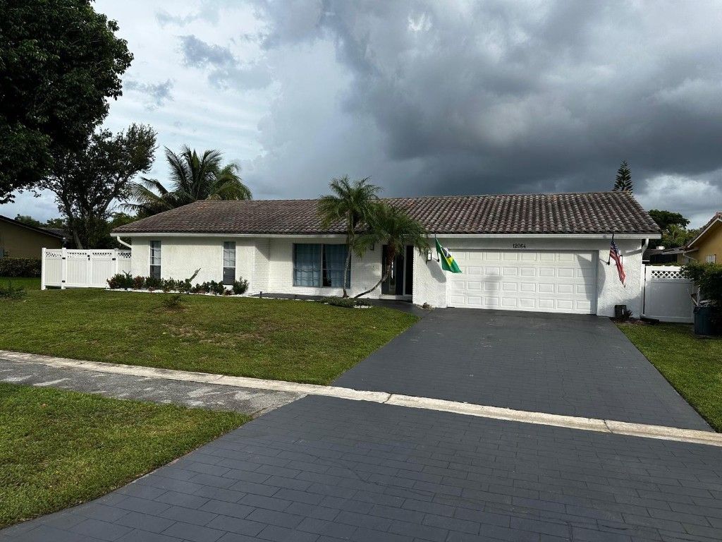 Photo of 12064 NW 24th Street, Coral Springs, FL 33065 (MLS # F10541946)