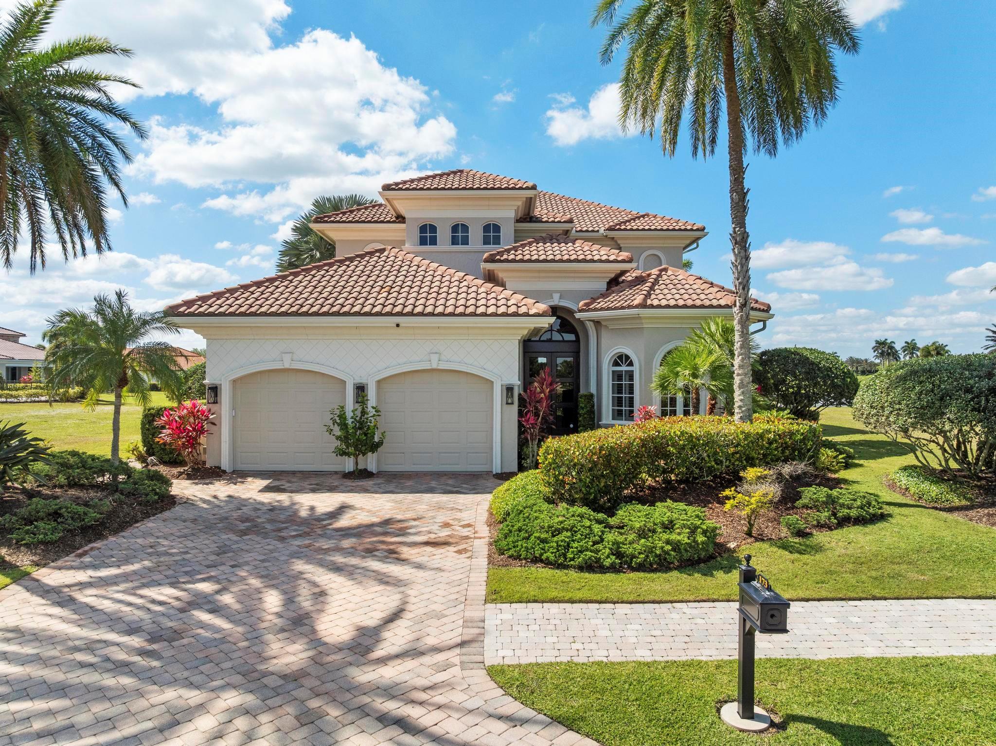 This exceptional three-bedroom residence, which includes a den and four bathrooms, is situated within the esteemed Tesoro Country Club. The layout incorporates an open floor plan that effectively showcases a newly renovated contemporary kitchen featuring a double island, substantial ceilings, and captivating views accessible from the primary living areas, balcony, and patio. The master bedroom is located on the first floor and includes a pre-installed elevator shaft, facilitating the potential installation of an elevator. Each bedroom is equipped with its own private ensuite bathroom, while the upper-level living space provides ample room for gatherings, enhanced by a sophisticated custom bar. The exterior of the property is equally impressive, featuring an oversized renovated pool and a