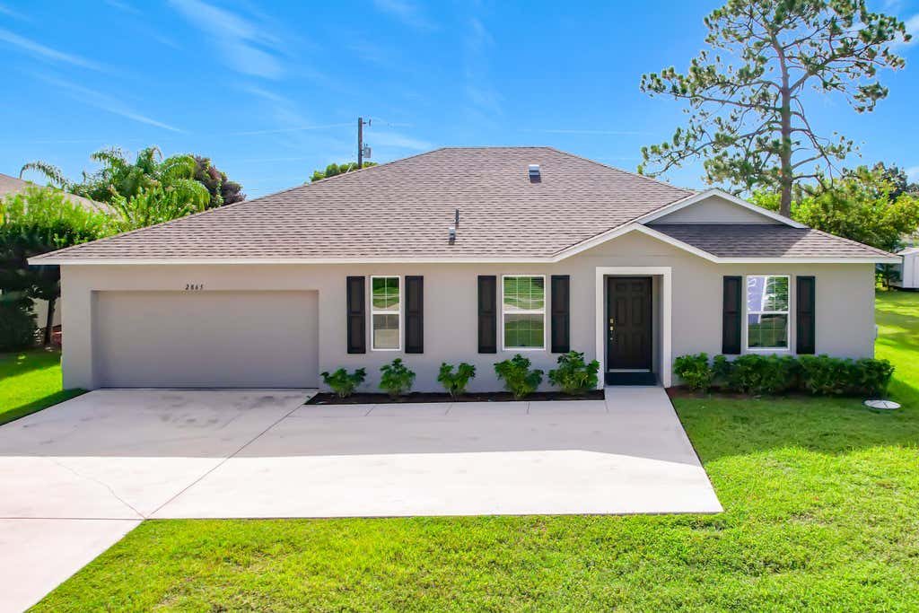Photo of 2865 SW Savona Boulevard, Port Saint Lucie, FL 34953 (MLS # B26060869)