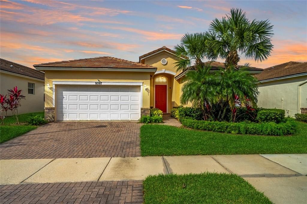 Photo of 9597 SW Lindale Trace Blvd, Port St Lucie, FL 34987 (MLS # F10358072)