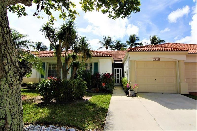 Photo of 6098 Lake Hibiscus Drive, Delray Beach, FL 33484 (MLS # B26080183)