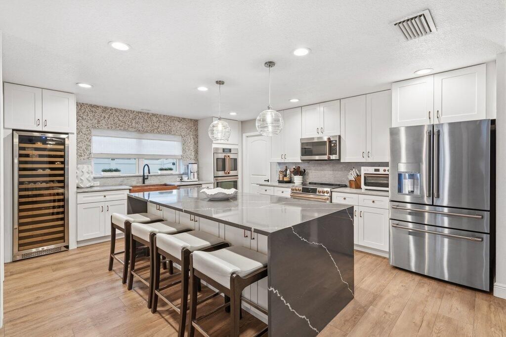 Photo of 5867 NW Leah Drive, Port Saint Lucie, FL 34986 (MLS # R11153247)