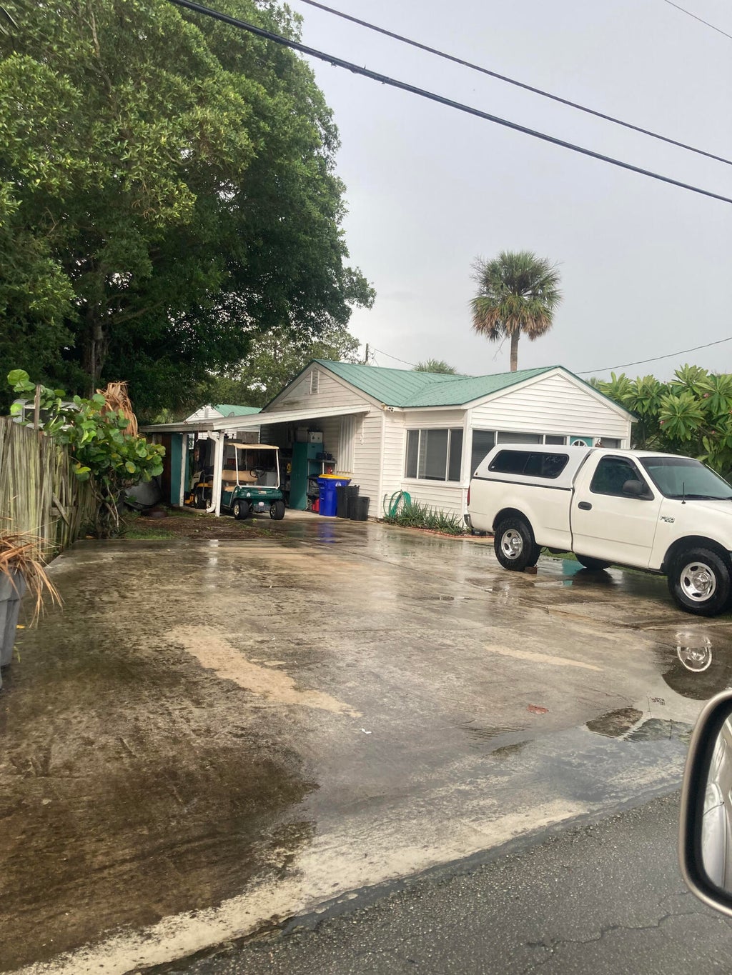 Photo of 2472 NE Pine Avenue, Jensen Beach, FL 34957 (MLS # B26056144)