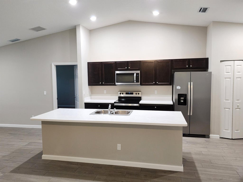 Photo of 5537 NW Burgin Street, Port Saint Lucie, FL 34986 (MLS # R11071681)