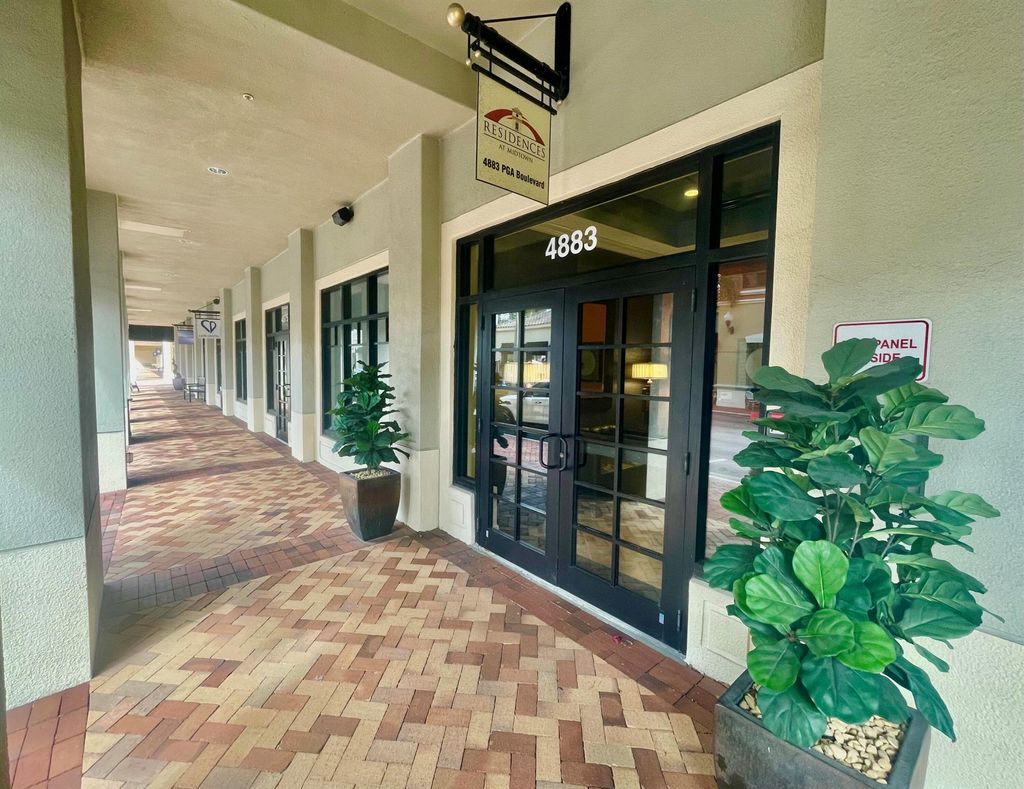 Photo of 4883 Pga Boulevard #301, Palm Beach Gardens, FL 33418 (MLS # R10960124)