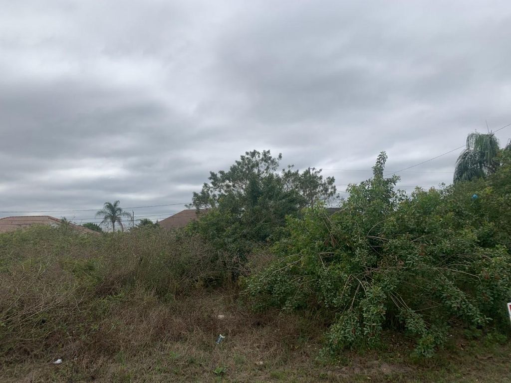 Photo of 612 SW Sarazen Avenue, Port Saint Lucie, FL 34953 (MLS # R10697236)