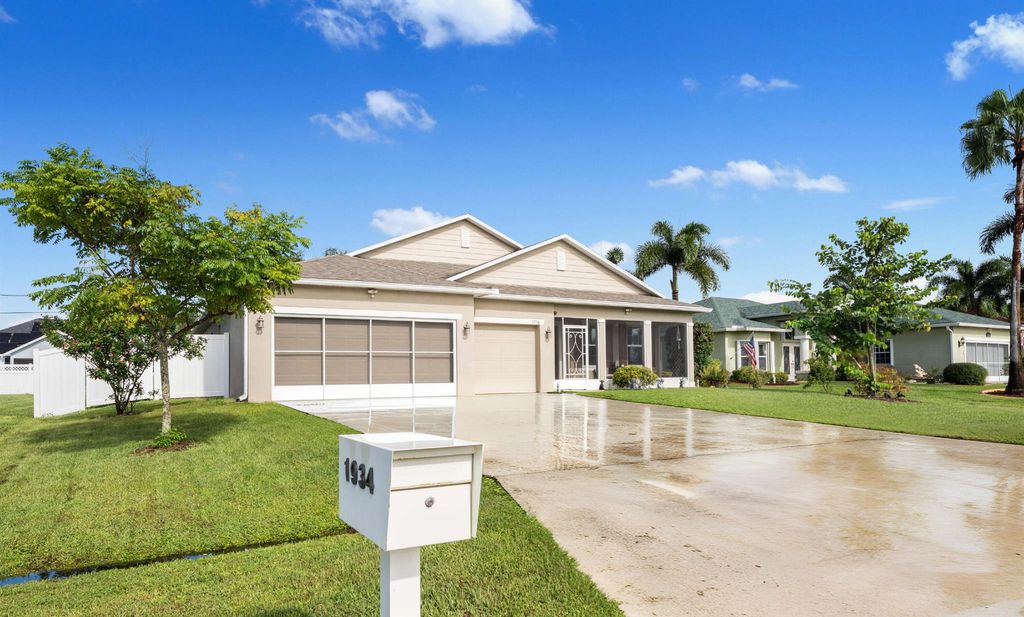 Photo of 1934 SW Logan Street, Port Saint Lucie, FL 34953 (MLS # R11128704)
