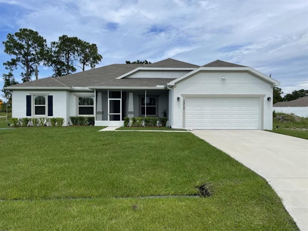 Photo of 1317 SE Odonnell Lane, Port Saint Lucie, FL 34983 (MLS # R10726523)
