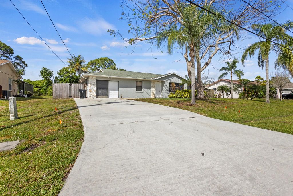 Photo of 1844 SW Brisbane Street, Port Saint Lucie, FL 34984 (MLS # R11078634)