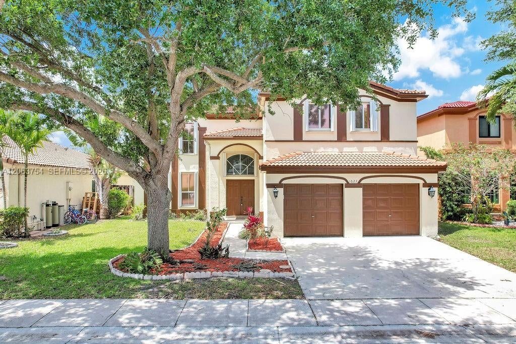 Photo of 1623 E Harmony Lake Circle, Davie, FL 33324 (MLS # A12063754)