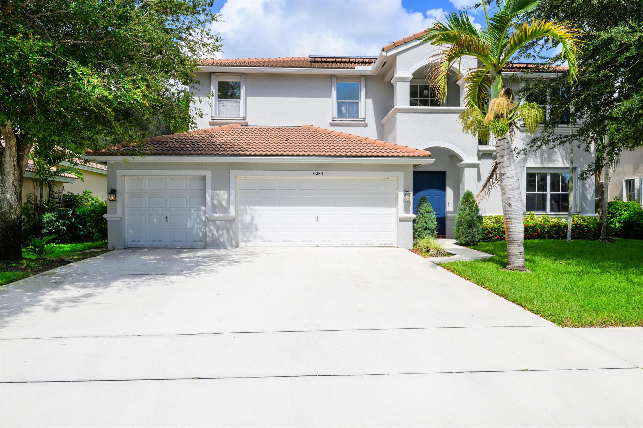 WOW! One of the most stunning homes in Winston Trails Golf Community (membership optional), just minutes from the beach. This upgraded Paris model features 5 bedrooms, 3 bathrooms, and a rare 3-car garage. Enjoy Italian porcelain flooring, a gourmet kitchen with stainless steel appliances, and refinished bathrooms. The oversized master suite offers breathtaking views of the canal, golf course, and greenbelt. Step outside to a screened saltwater pool with waterfall and cabana batha"perfect for entertaining. No rear neighbors, accordion shutters, central vacuum, and well-fed sprinklers. A must-see!