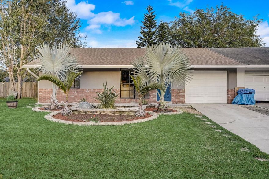 Welcome to 4365 SE Nimrod Ln, Stuart, FL - where contemporary elegance meets functionality in this meticulously upgraded home. Boasting 3 full bedrooms and 2 newly renovated bathrooms, this residence also features a versatile den, perfect for a home office or additional living space. The heart of the home, the kitchen, has been tastefully upgraded with granite countertops and top-of-the-line Stainless Steel appliances. The exterior showcases fresh paint, while the landscaping has been meticulously enhanced for curb appeal.   Step inside to find a cohesive design with fresh interior paint and high-end tile flooring seamlessly flowing throughout. The master bath has been transformed into a spa-like retreat with a new vanity, enhanced lighting and a brand new shower enclosure adorned with