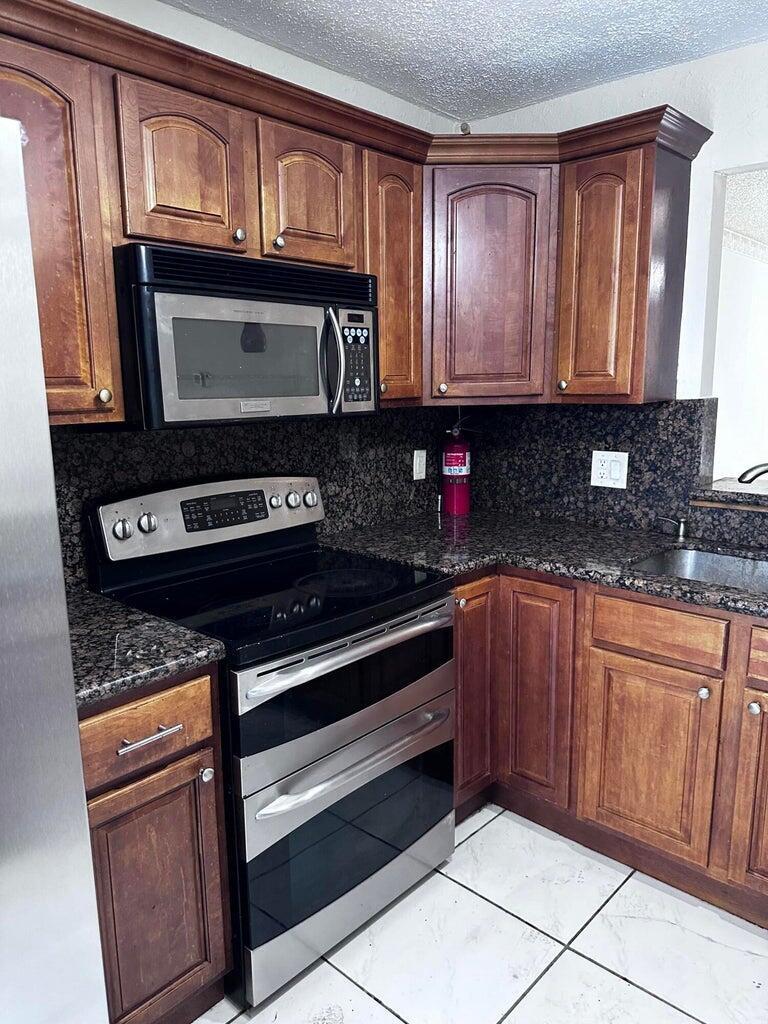 Photo of 6200 S Falls Cir Drive #310, Lauderhill, FL 33319 (MLS # B26041018)