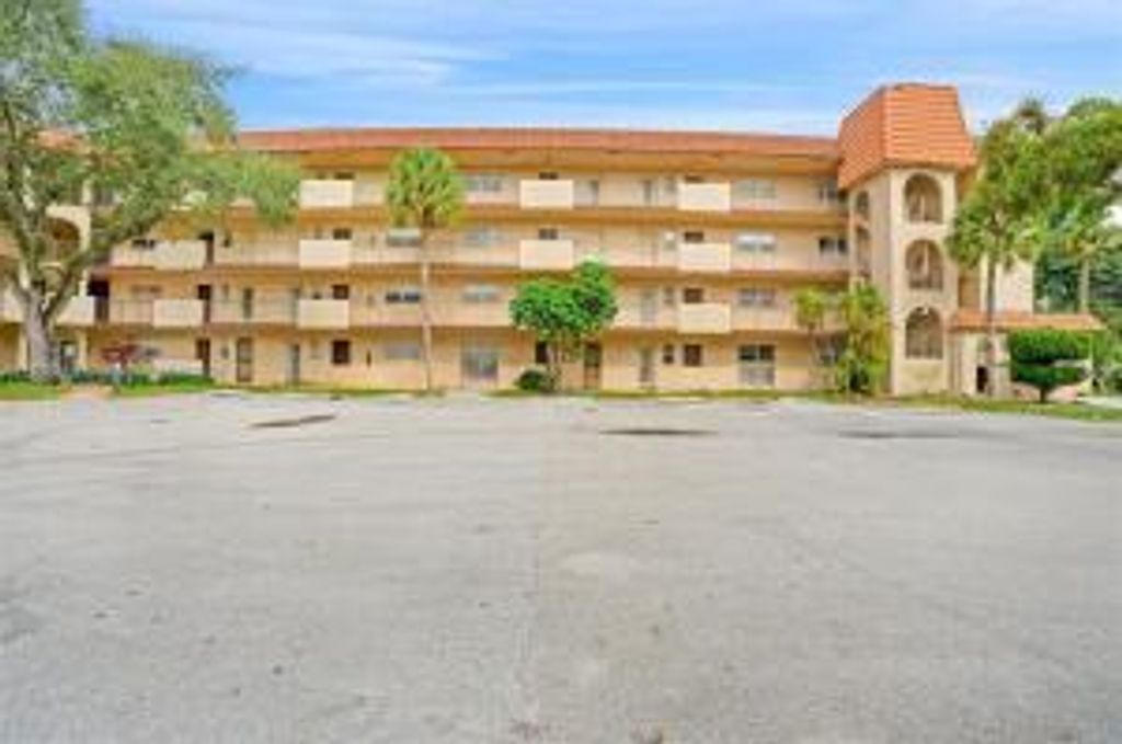 Photo of 6200 S Falls Cir Drive #310, Lauderhill, FL 33319 (MLS # B26041018)