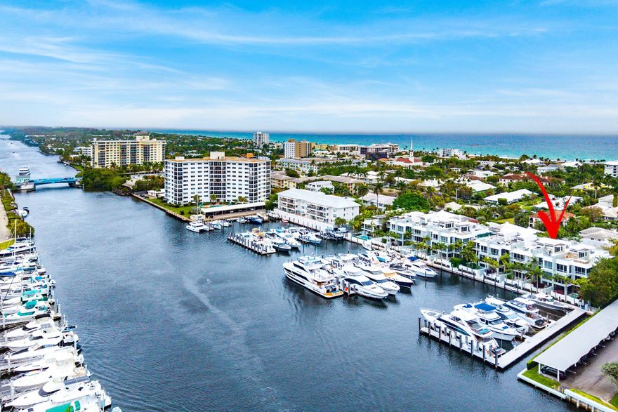 Welcome to the Seagate Yacht Club Residences. This waterfront townhome offers a rare mix of privacy, walkability, and direct Intracoastal living in a private enclave of just ten homes. Built in 2016 and ideally located on the barrier island, just three blocks from the beach and a short walk to Atlantic Avenue, the residence enjoys close proximity to downtown Delray while still feeling quiet and tucked away. Perfectly centered on the channel, this unit captures some of the most compelling direct Intracoastal views in the community, with passing boats and yachts bringing the setting to life. Walls of glass frame the water from nearly every angle, while a chef's kitchen anchors the main living space.  Multiple oversized terraces, a private pool, and a massive rooftop deck with summer kitchen and fire pit create a strong indoor-outdoor connection that feels just as suited for day-to-day living as it does for entertaining.  Living area is believed to be approximately 4,002 +/- square feet, but the actual living square footage is unknown and has not been verified by Seller or Listing Broker. Buyer shall rely on their own measurements, inspections, and due diligence.