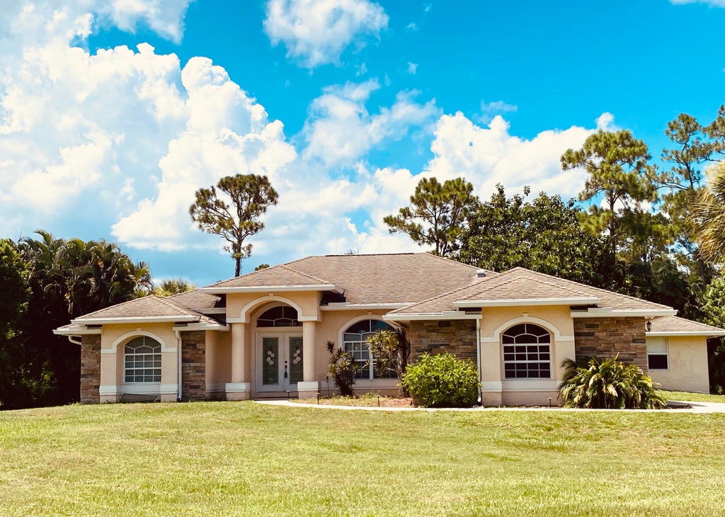 Photo of 13381 83rd Lane N, West Palm Beach, FL 33412 (MLS # R11009461)