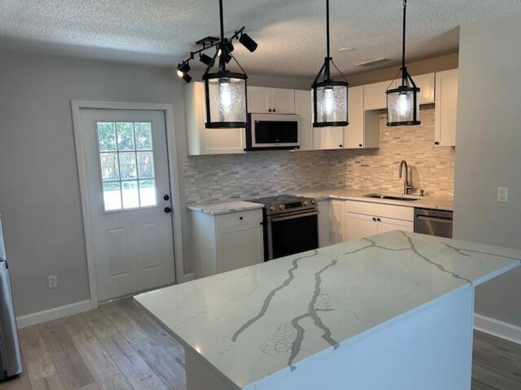 Photo of 4710 Seagrape Drive, Fort Pierce, FL 34982 (MLS # R10973500)