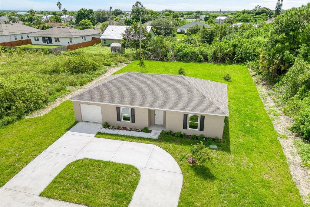 Photo of 316 SW Becker Road, Port Saint Lucie, FL 34953 (MLS # R11027190)