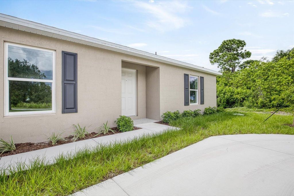 Photo of 316 SW Becker Road, Port Saint Lucie, FL 34953 (MLS # R11027190)