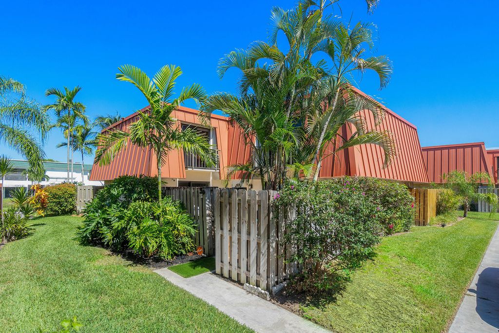 Photo of 3211 Gardens East Drive #A, Palm Beach Gardens, FL 33410 (MLS # R10983654)
