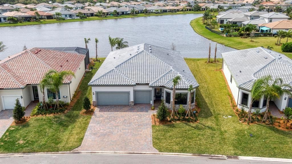Photo of 818 SE Courances Drive, Port Saint Lucie, FL 34984 (MLS # F10445665)