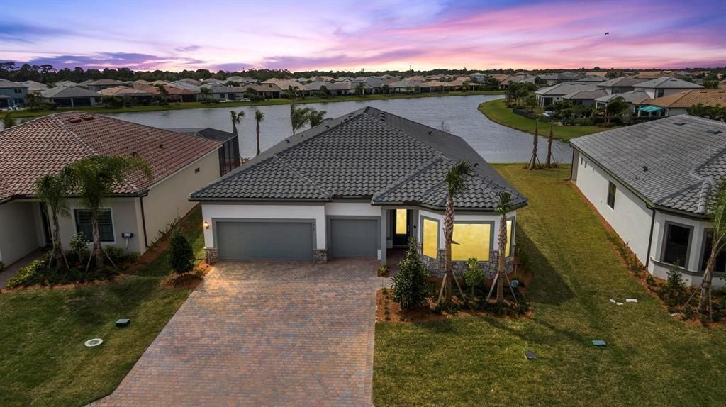 Photo of 818 SE Courances Drive, Port Saint Lucie, FL 34984 (MLS # F10445665)