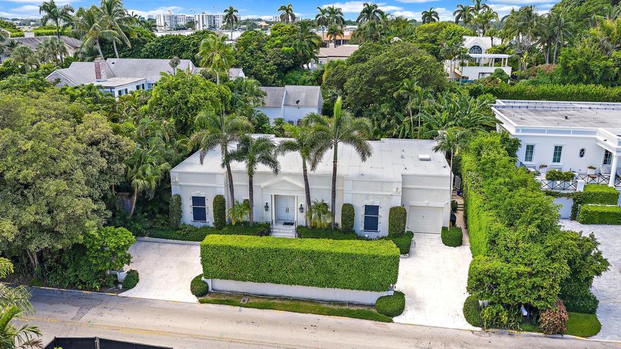 Exceptional North End Opportunity! Unlock the potential of this prime 10,882+/- SF Island parcel, perfectly positioned on a rare coral ridge with an impressive 13+ feet of elevation. Whether you choose to reimagine the existing Regency-style residence or build your dream home, the possibilities are endless. The current layout features soaring ceilings, 3 bedrooms, 3.5 baths, a sparkling pool, new roof, and a whole-house generator--providing an excellent foundation for a stunning transformation. A coveted North End location combines privacy, prestige, and proximity to the best of Palm Beach.