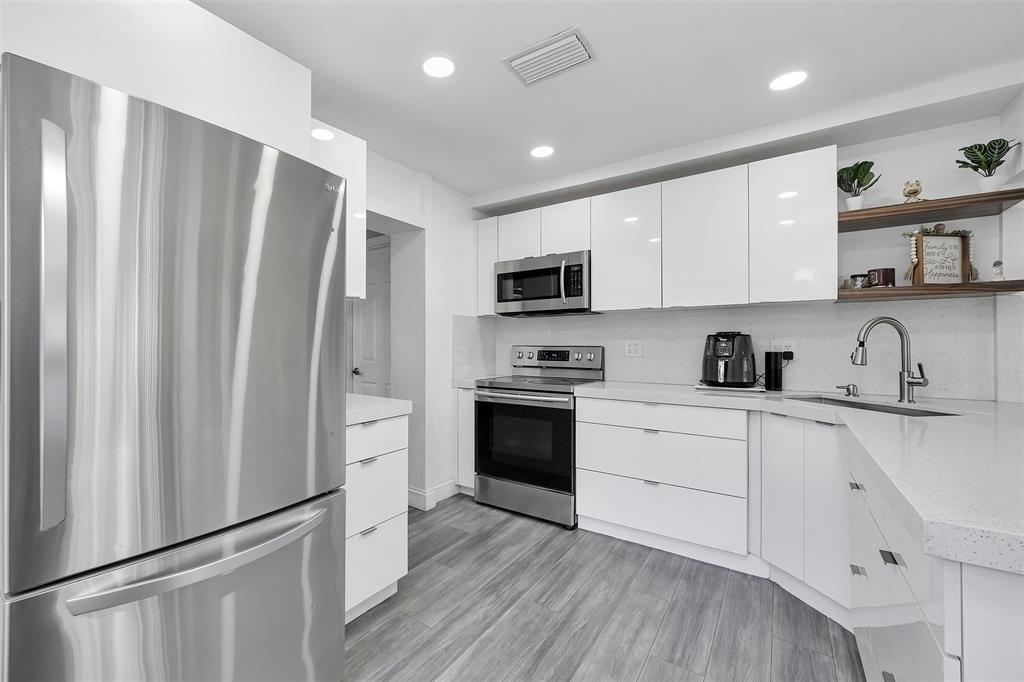 ?? Stop scrolling — this is the home you’ve been waiting for! Own this fully renovated 3-bedroom, 2-bath gem with minimum down payment and move in without lifting a finger. Sitting on a generous 6,741 sq. ft. lot, there’s room to build your dream pool, set up an outdoor kitchen, or create the perfect entertaining space. Inside, enjoy a bright layout, spacious master suite, and beautifully updated bathrooms. With a brand-new roof, impact windows, modern electric panel, 2019 plumbing, and a 7-year-old AC, all the big-ticket items are done. Stylish finishes give this home a fresh, modern look that’s truly turn-key. Why rent when you can own? Schedule your showing today and fall in love at first sight!
