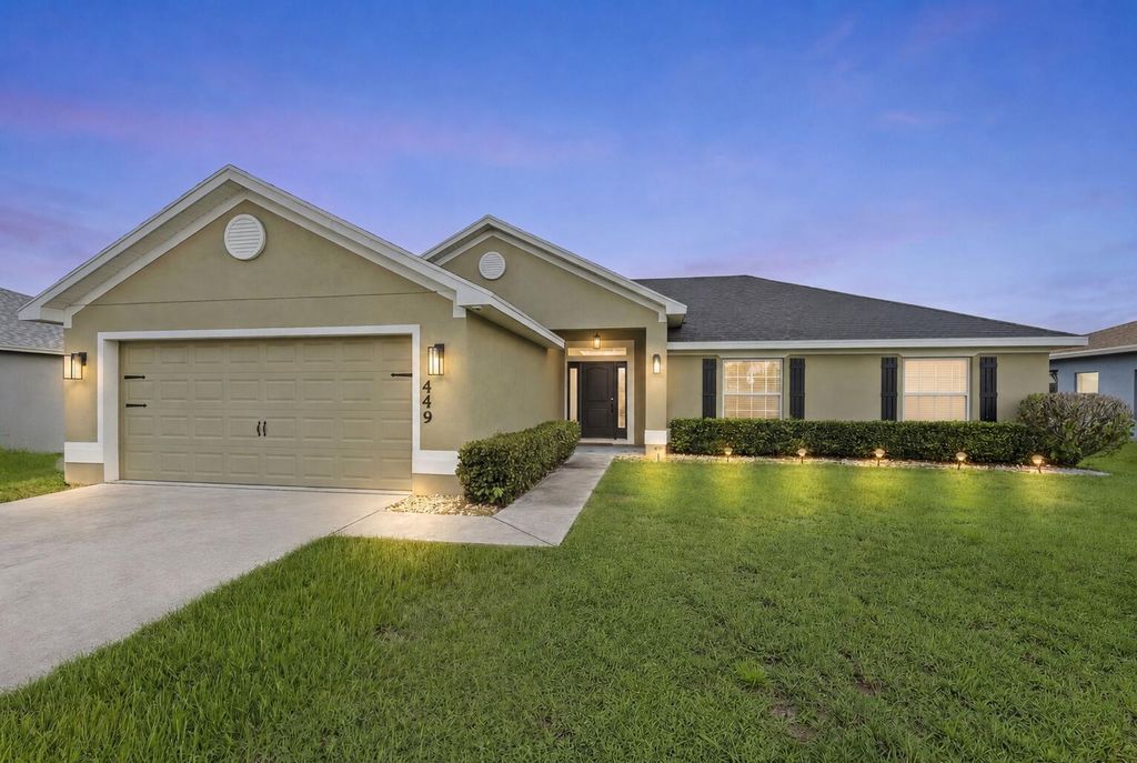 Photo of 449 SW Exmore Avenue, Port Saint Lucie, FL 34983 (MLS # B26036709)