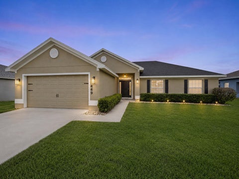 Photo of 449 SW Exmore Avenue, Port Saint Lucie, FL 34983 (MLS # B26036709)
