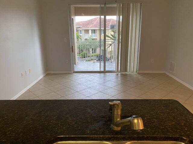 Photo of 6492 Emerald Dunes Drive #303, West Palm Beach, FL 33411 (MLS # R11091146)