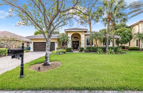 Photo of 326 NW 120th Drive, Coral Springs, FL 33071 (MLS # B26027355)