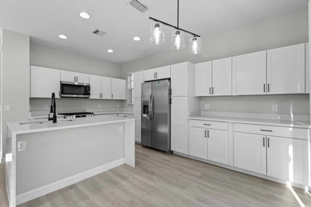 Photo of 606 Moondancer Court, Palm Beach Gardens, FL 33410 (MLS # R11012200)