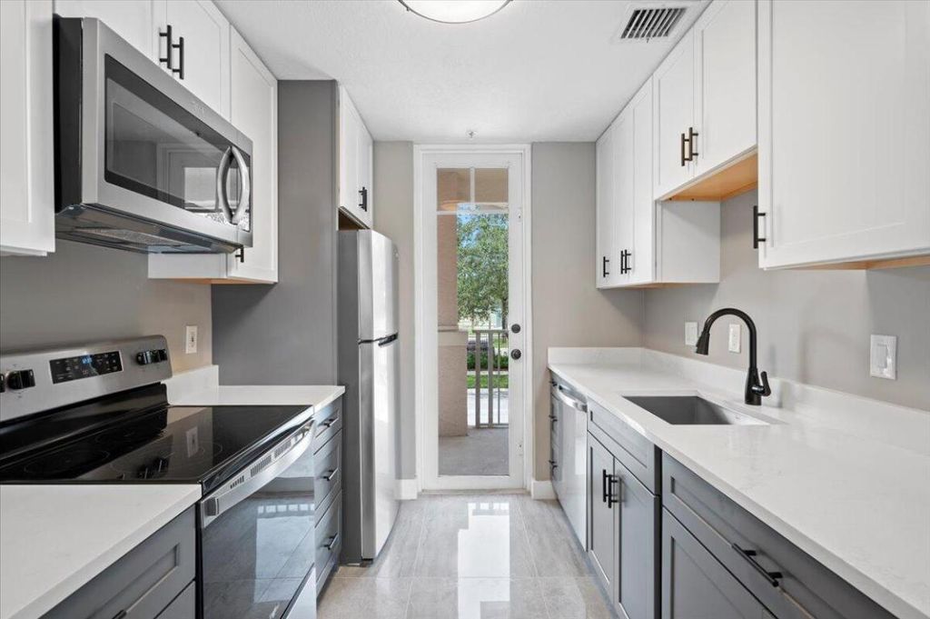 Photo of 1080 University Boulevard #21, Jupiter, FL 33458 (MLS # R10982422)