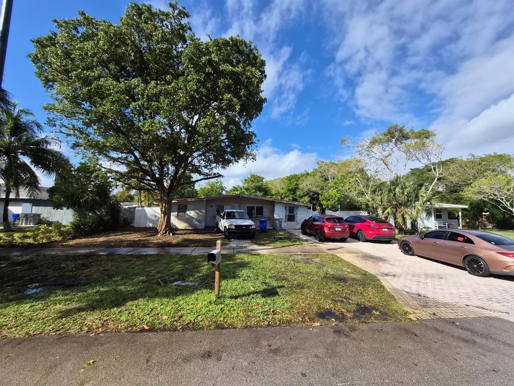 Photo of 5183 NE Ne 15th Ave, Pompano Beach, FL 33064 (MLS # R11148623)