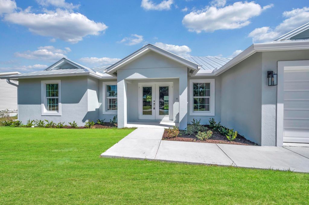 Photo of 5604 Hickory Drive, Fort Pierce, FL 34982 (MLS # R10965155)