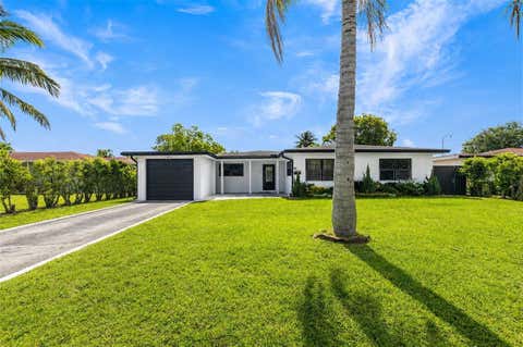 Photo of 24 NW 42nd Terrace, Plantation, FL 33317 (MLS # B26048156)