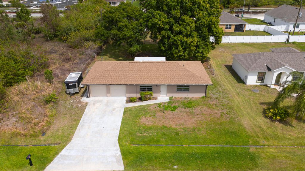 Photo of 549 SW Buswell Avenue, Port Saint Lucie, FL 34983 (MLS # B26010545)