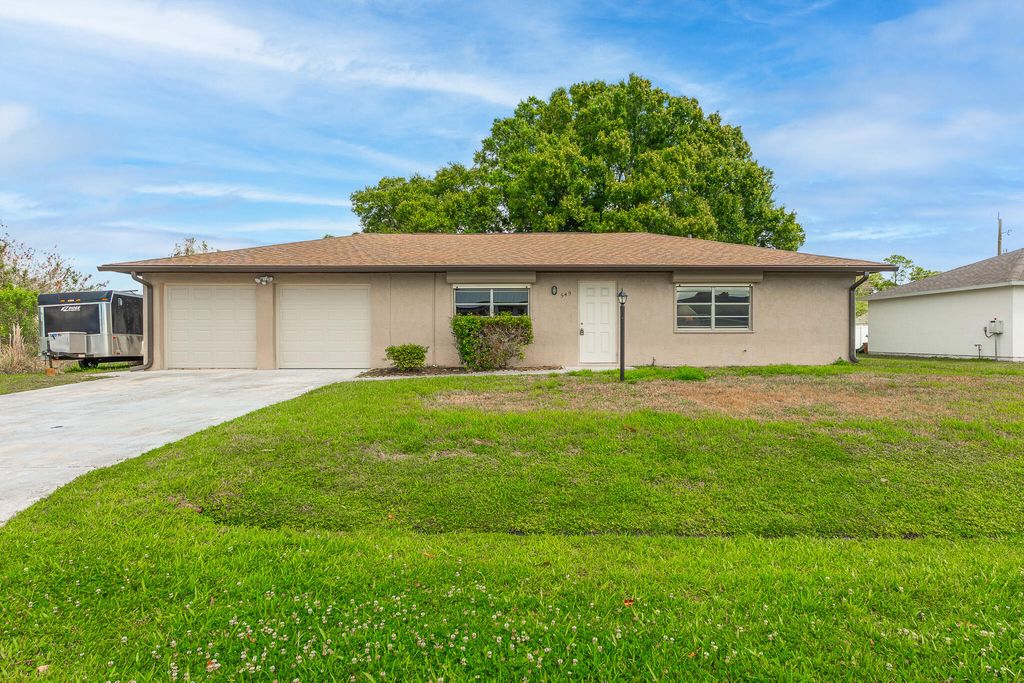 Photo of 549 SW Buswell Avenue, Port Saint Lucie, FL 34983 (MLS # B26010545)