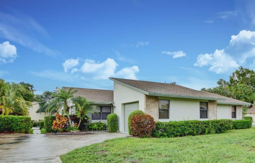 Beautiful renovated 2 Bedrooms, 2 Baths Patio Home with attached Garage for sale in Rainberry Bay a +55 community. One story home features a split bedroom plan, washer & dryer, one car garage, and tile floors throughout. CBS construction. 24 hour manned gated community with security patrol. Amenities include; 5 heated pools, 4 spas, 2 Clay Tennis Courts, fitness center, library, billiard room, and a theater. This community is close to downtown Delray Beach dining and the beaches.The monthly HOA fee includes cable, Internet, cable boxes that record, lawn maintenance, pest control, painting the exterior home plus repair and replacement of the roof when needed.