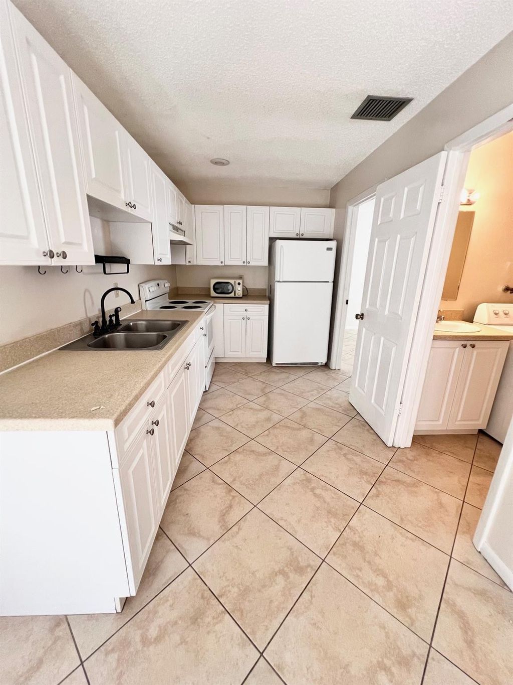 Photo of 2002 S 10th Street #Apt D, Fort Pierce, FL 34950 (MLS # F10549737)