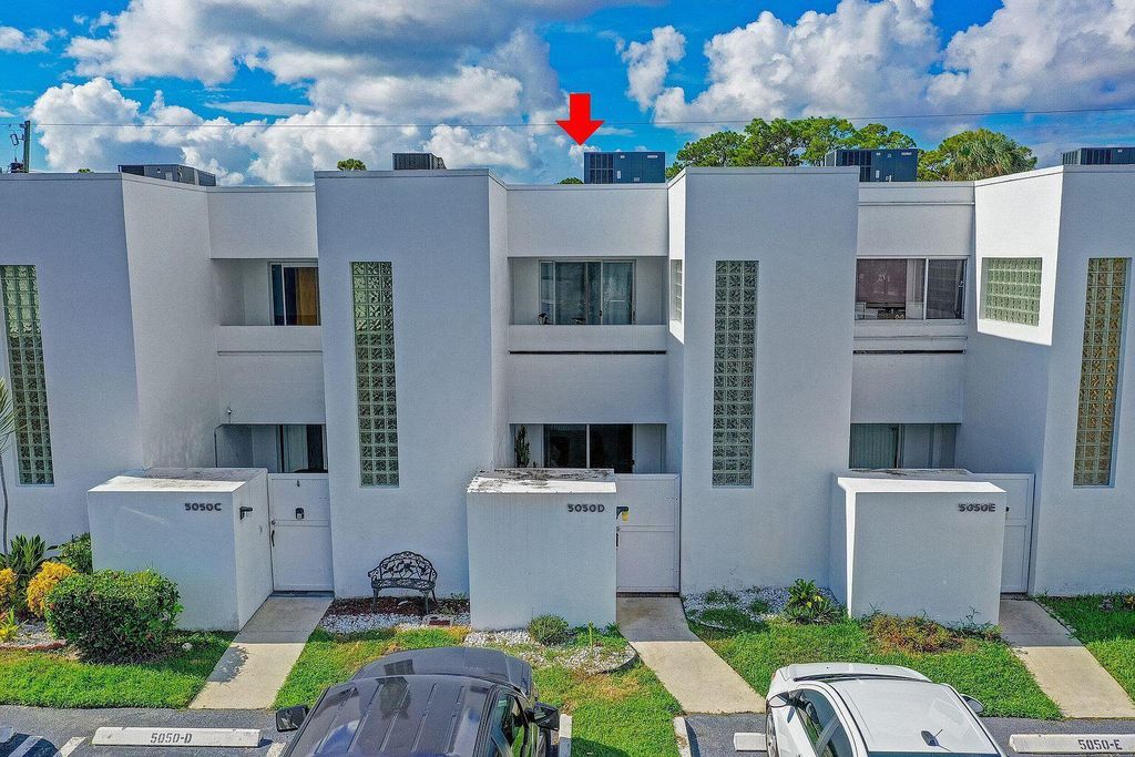 Photo of 5050 Elmhurst Road #D, West Palm Beach, FL 33417 (MLS # B26019582)