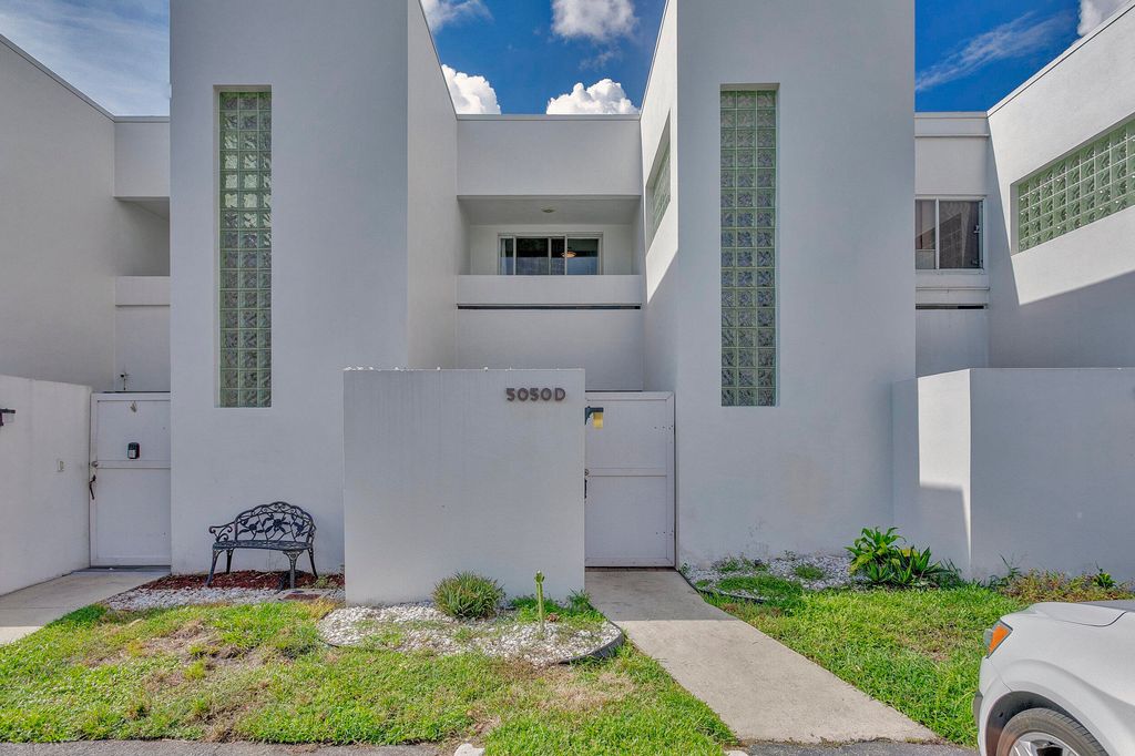 Photo of 5050 Elmhurst Road #D, West Palm Beach, FL 33417 (MLS # B26019582)