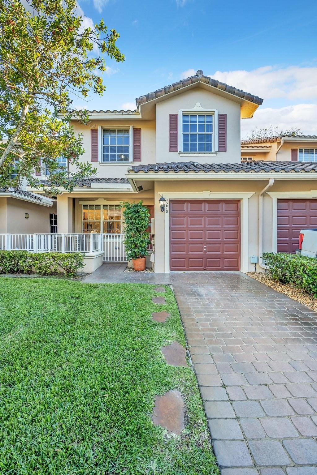 Davie Townhouse ...Totally Upgraded. Like new condition. 3 bedroom plus Den with closet and full bath downstairs, could be 4th bedroom. 2 full baths upstairs. garage, separate laundry room with laundry tub. New washer and Dryer. Patio with remote roll-down invisible screen and designer Mexican Tile. Kitchen remodeled with wood cabinets, quartz counter-top and deluxe stainless steel appliances, Downstairs is tiled, new carpeting upstairs. Volume ceiling with crown molding thru out. Roman tub with separate shower. Accordion shutters. Prime location, close to HCA Florida University Medical Hospital, all colleges, shopping and major arteries of transportation.