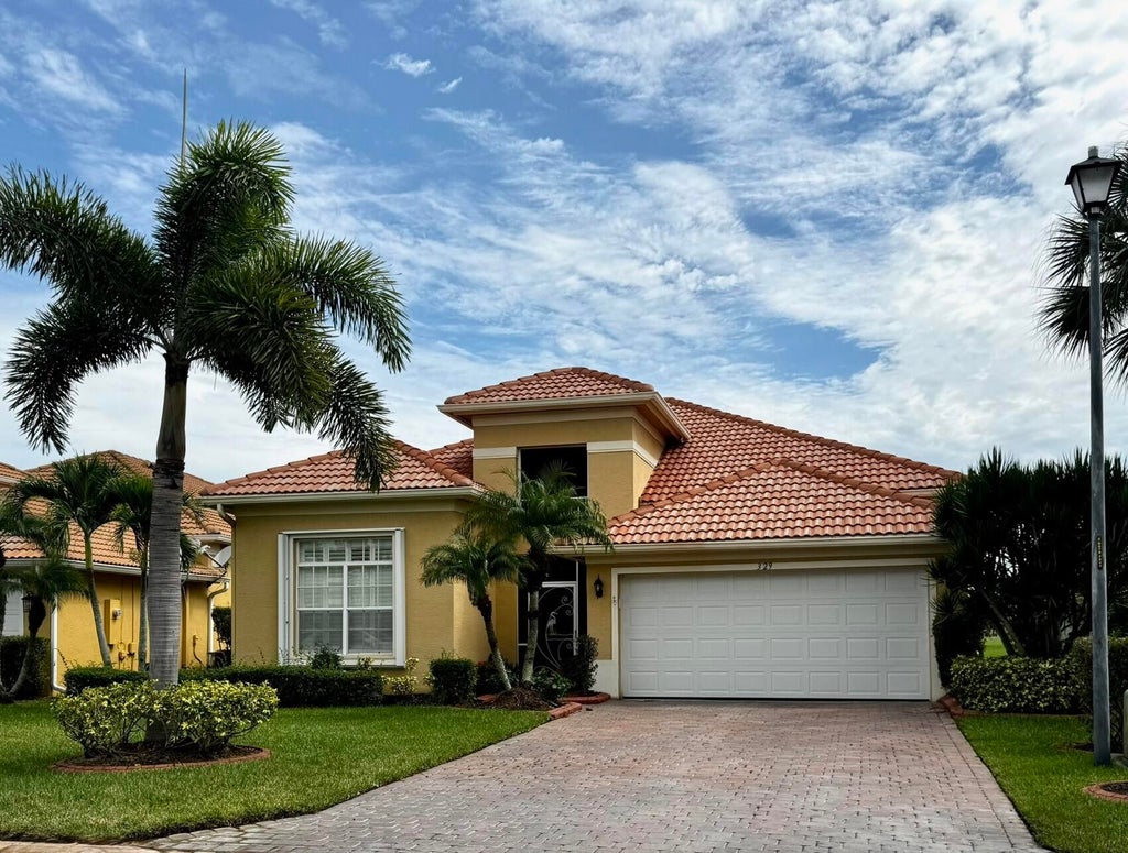 Photo of 329 NW Somerset Circle, Port Saint Lucie, FL 34983 (MLS # R11107945)