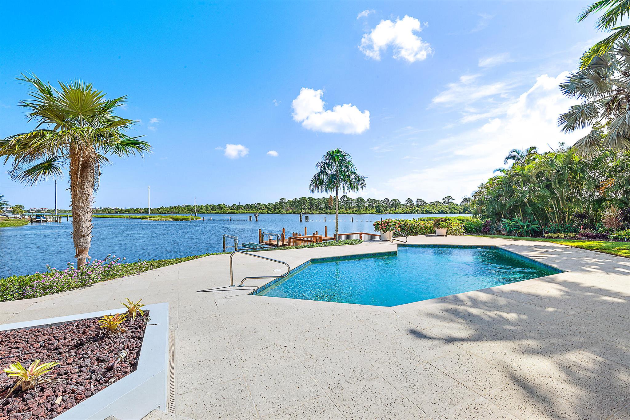 DIRECT INTRACOASTAL PROPERTY! This stunning 4-bedroom, 4.1-bathroom residence offers an unparalleled lifestyle with 180 feet of Intracoastal waterfrontage. Nestled on a peaceful cul-de-sac on prestigious Commodore Island, this property boasts breathtaking views of the adjacent State Park. This is a rare opportunity to own a piece of paradise on Commodore Island. Schedule your private tour today and envision the lifestyle you've always dreamed of!