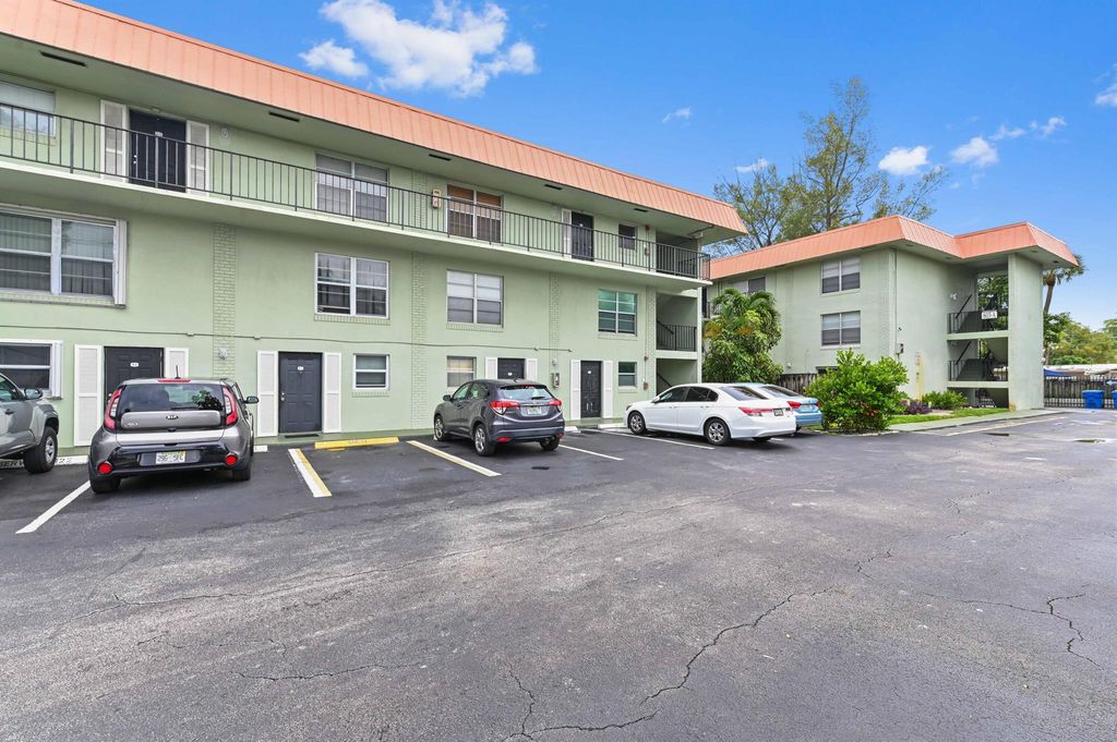 Photo of 803 W Oakland Park Boulevard #A7, Oakland Park, FL 33311 (MLS # R11132807)