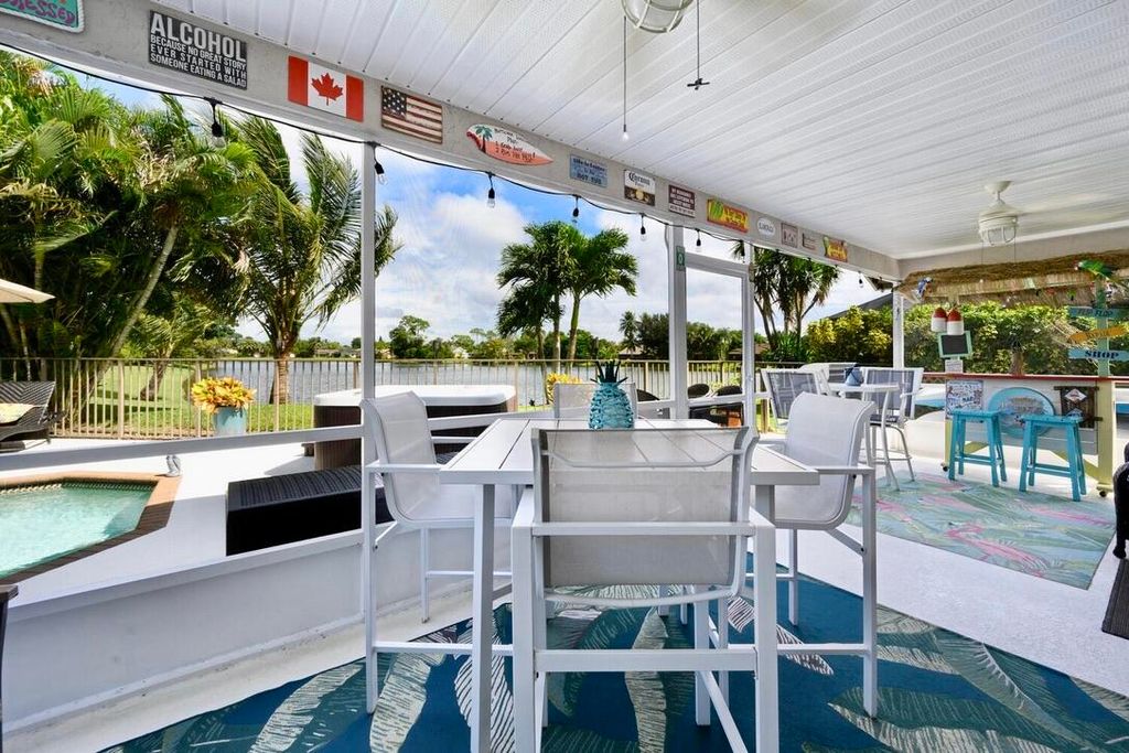 Photo of 187 Parkwood Drive, Royal Palm Beach, FL 33411 (MLS # R11128660)