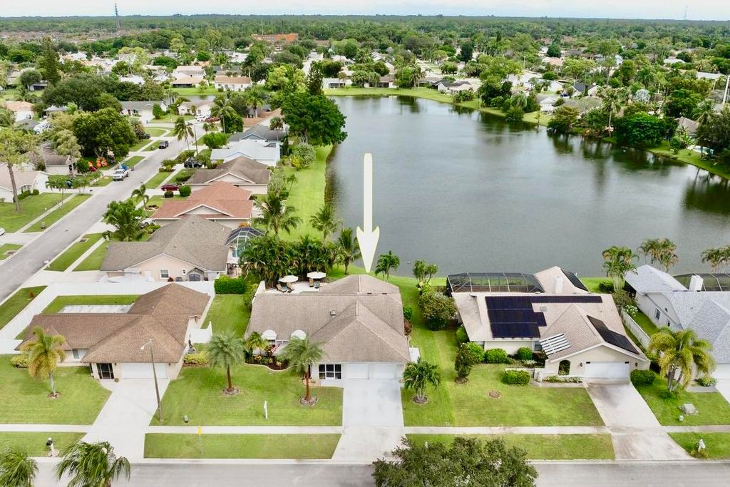 Photo of 187 Parkwood Drive, Royal Palm Beach, FL 33411 (MLS # R11128660)